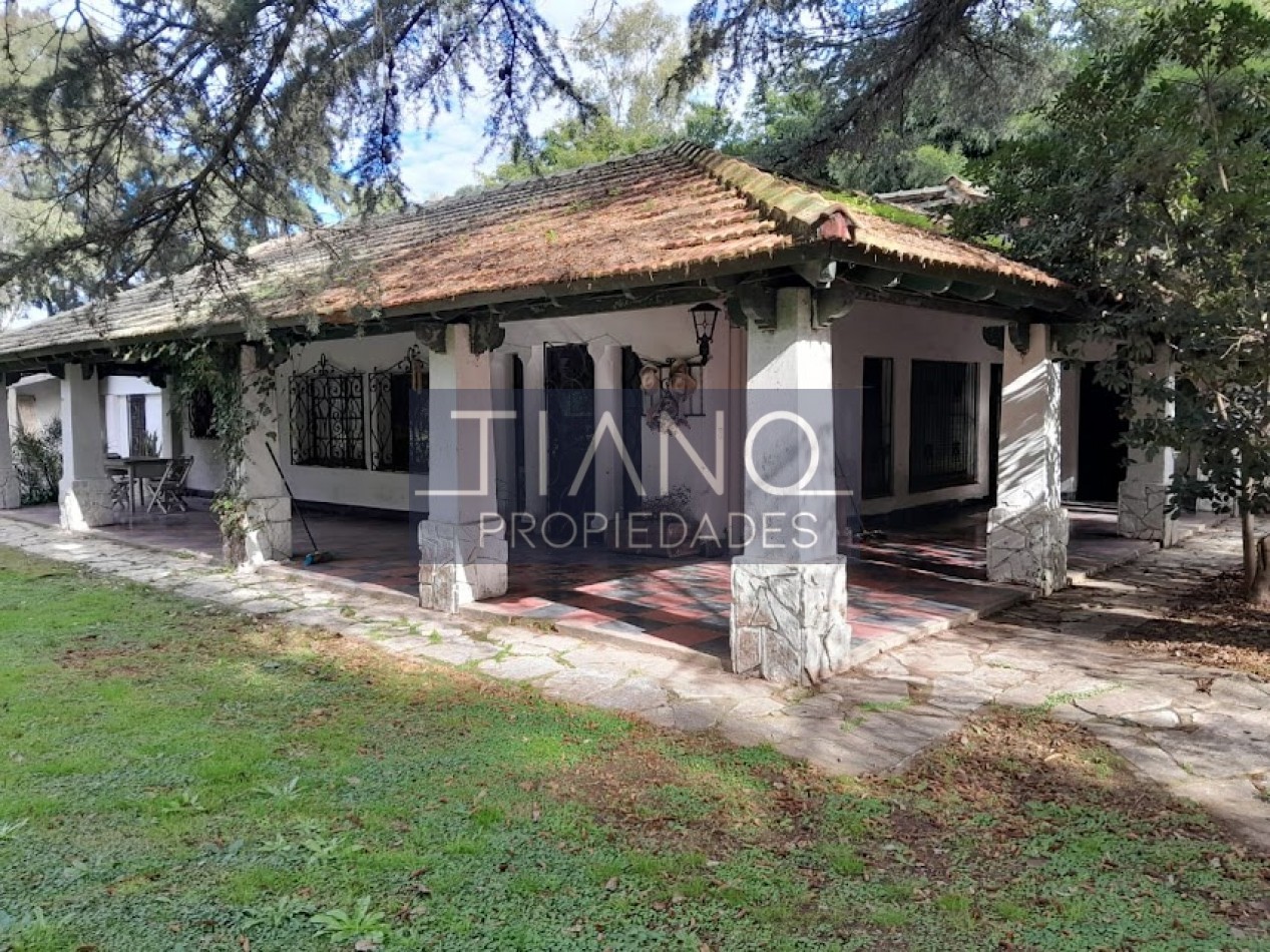 Arbolada casa de campo