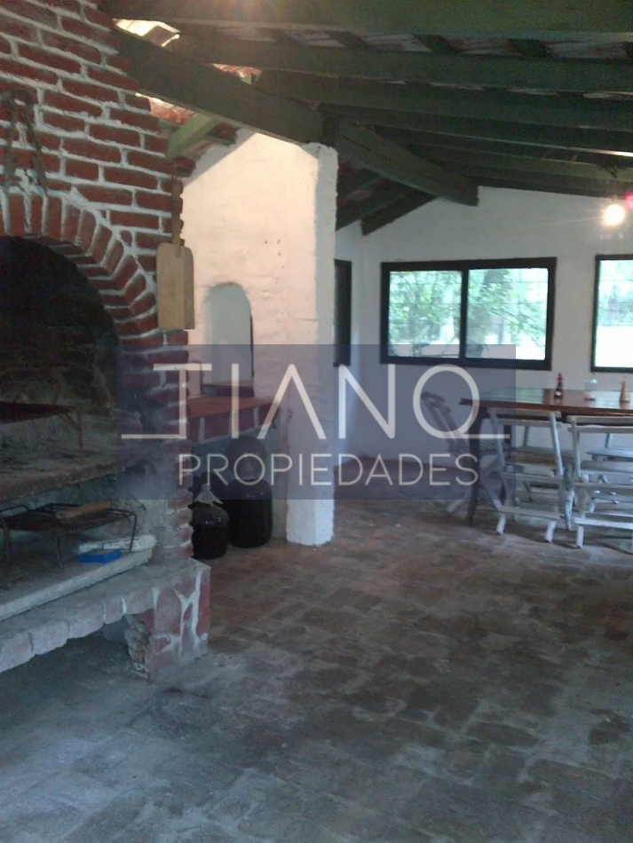 Arbolada casa de campo