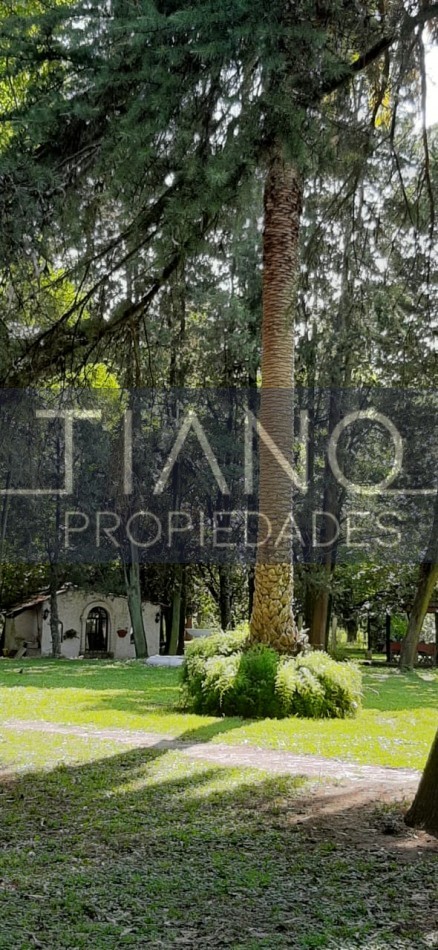 Arbolada casa de campo